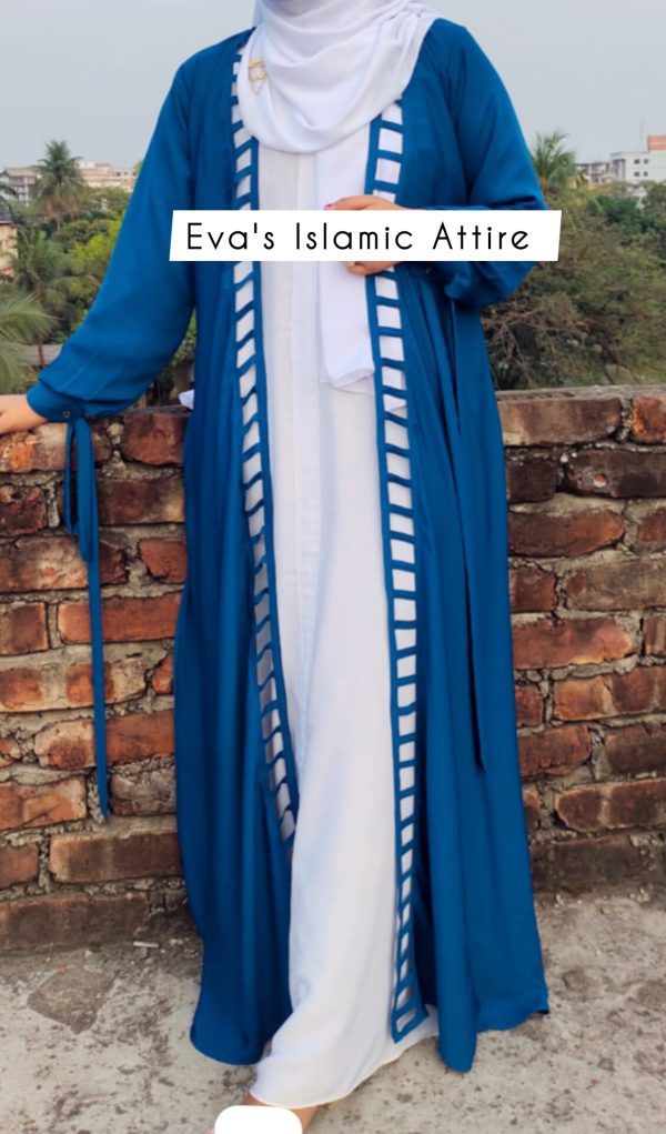 a woman wearing a blue abaya